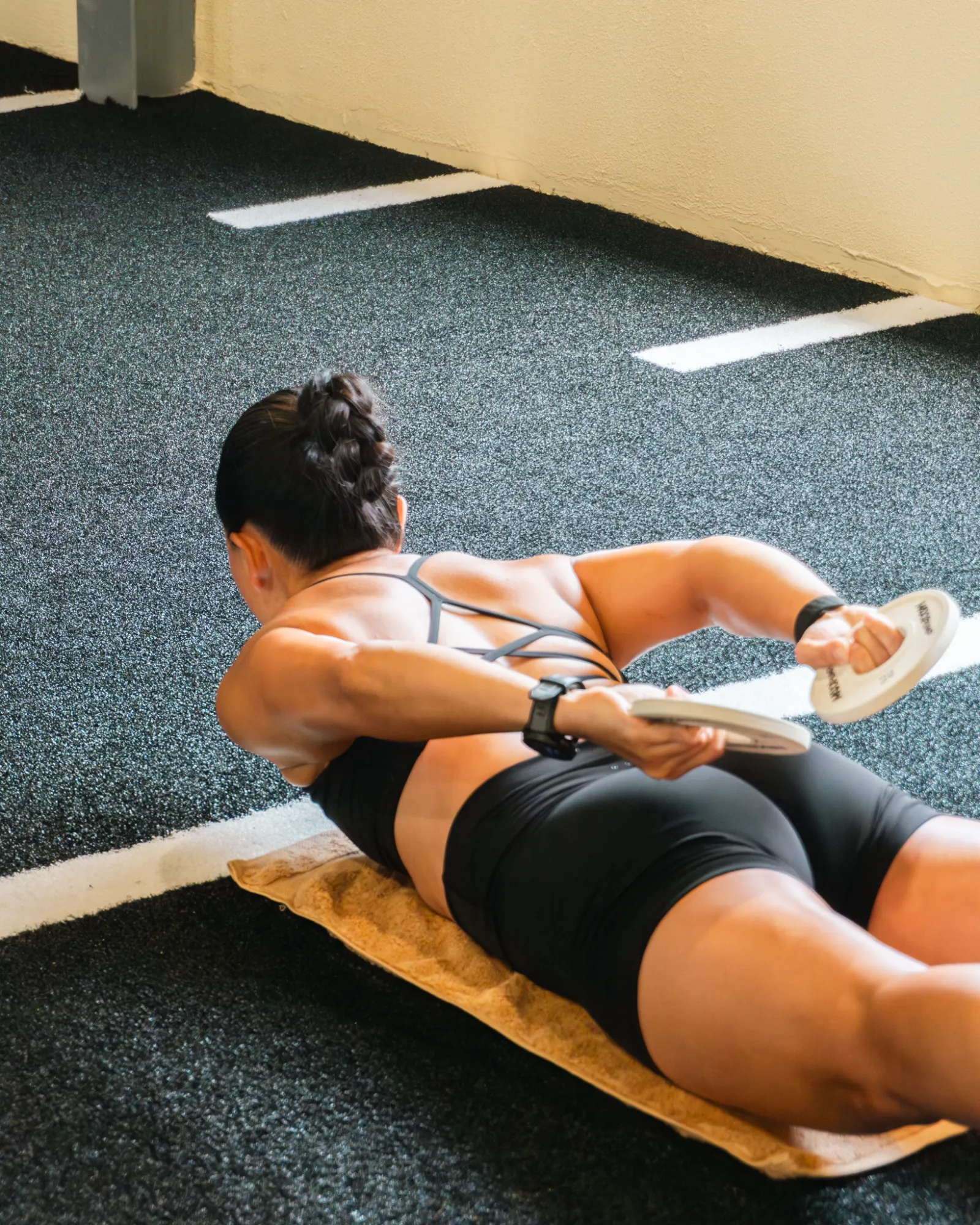 ICON client training core strength on the gym floor